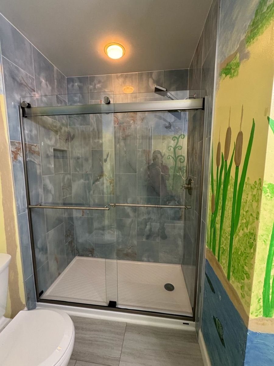 Bathrooms with thoughtful details — completed Ajanel project